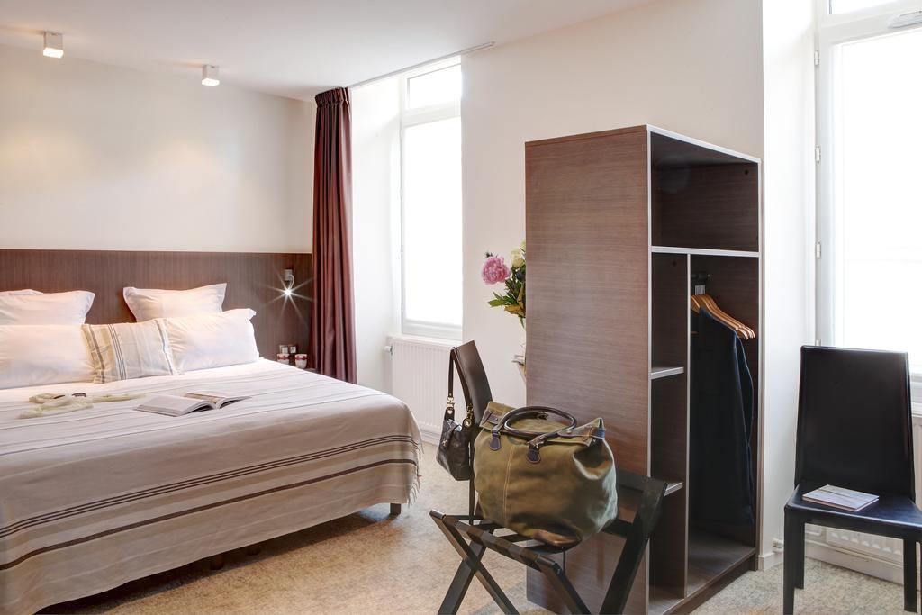 Hotel Le Benhuyc Binic Habitación foto